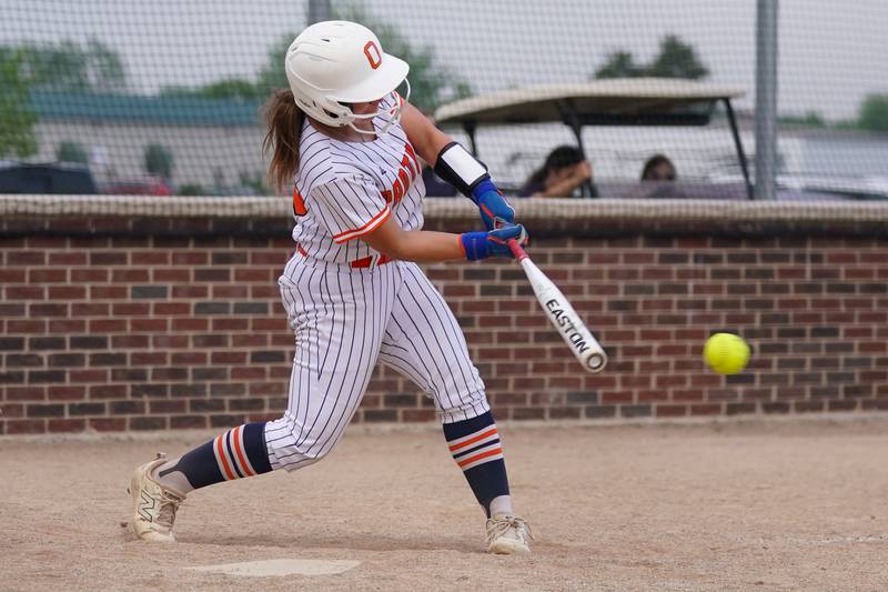 Oswego’s Leah McKenzie slaps a single against Yorkville during a softball game at Oswego High School on Thursday, May 15, 2025.