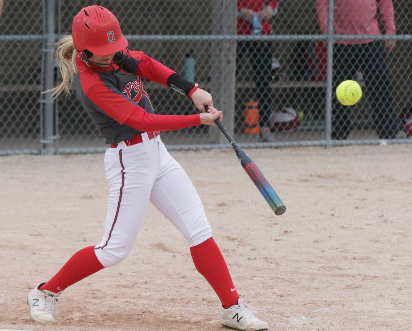 Ottawa's Brynne Sember (14) makes contact against L-P on Monday, May 2, 2022, at Veteran's Park in Peru.