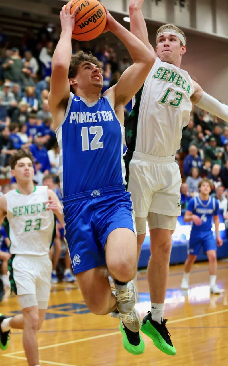 Princeton's Asa Gartin shoots in front of Seneca's Paxton Giertz in Friday's regional finals at Prouty Gym. The Tigers won 59-53.