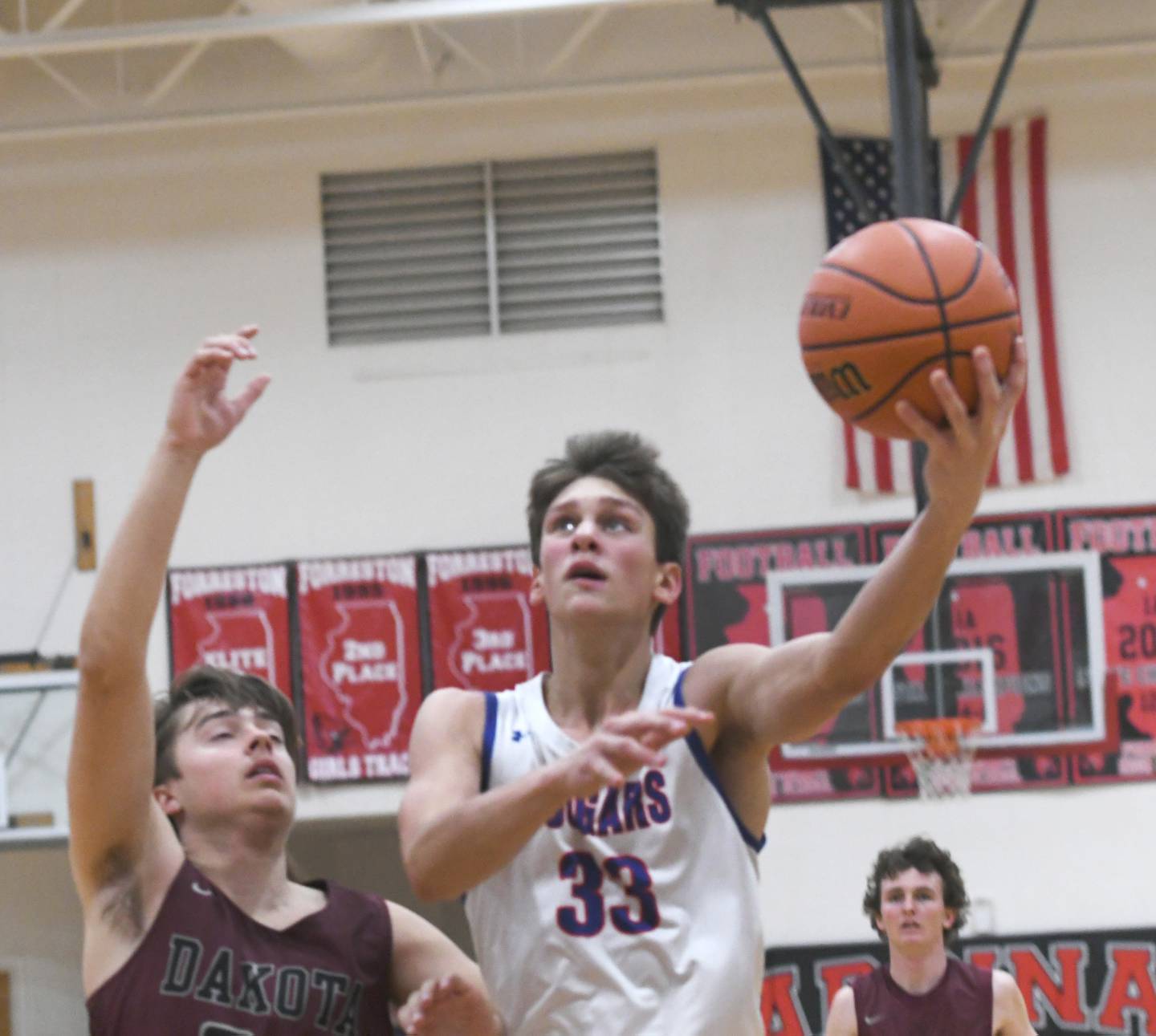 Eastland's Parker Krogman shoots against Dakota during Saturday action against Lena-Winslow at the 61st Forreston Holiday Tournament.