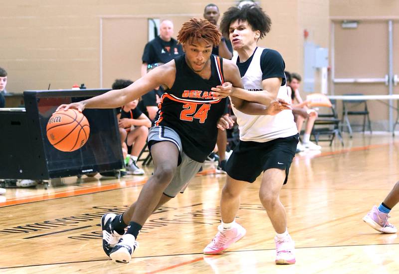 DeKalb's Alim Shah drives past a defender during their game with Streamwood Tuesday, June 6, 2022, in a summer tournament at DeKalb High School.