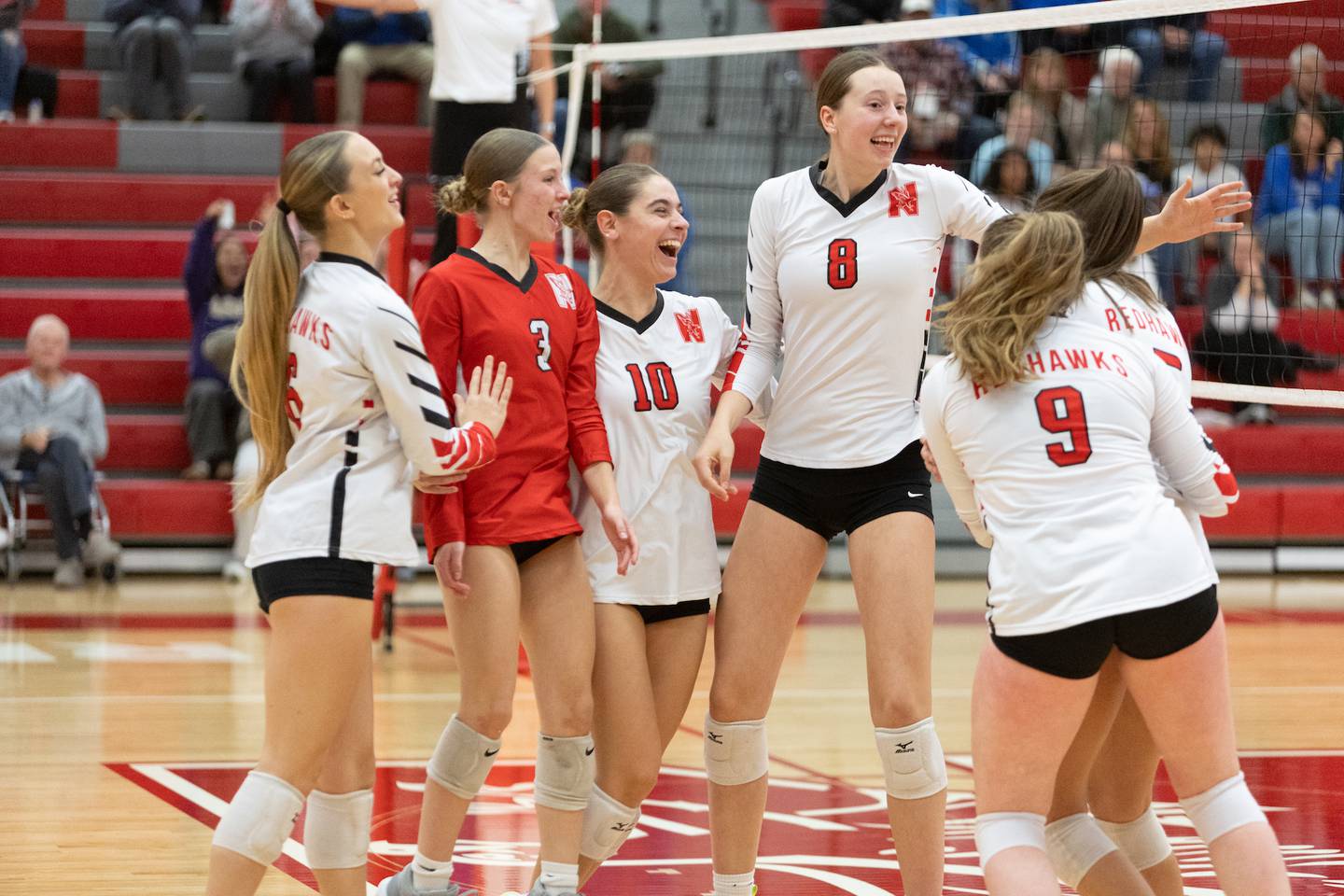 Naperville Central celebrates a point against St. Charles North at the Class 4A Regional Final on Thursday, October 30,2025 in Naperville.