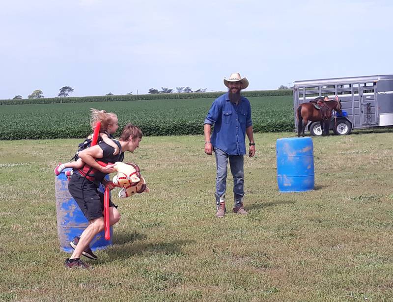 Adults and children participated in activities Thursday, July 25, 2022, at the Arena of Hope in rural Cornell led by the Leon River Cowboy Church in Eastland, Texas.