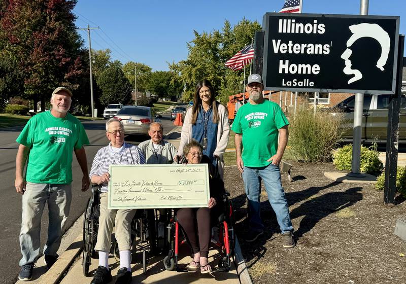 Mort’s Pub in La Salle raised a record-breaking $14,000 for the Illinois Veterans Home in La Salle during its annual golf fundraiser.