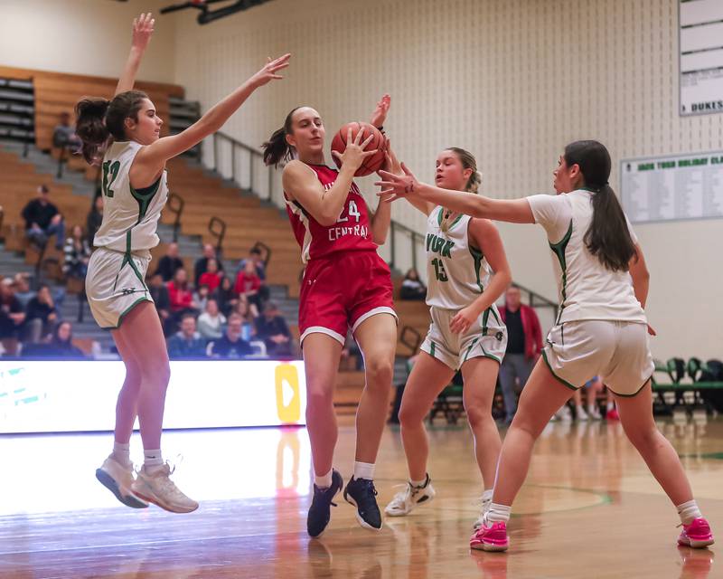 The York defense collapses on Hinsdale Central's Greta Dani (24) as she drives down the lane during basketball game between Hinsdale Central at York. Dec 8,