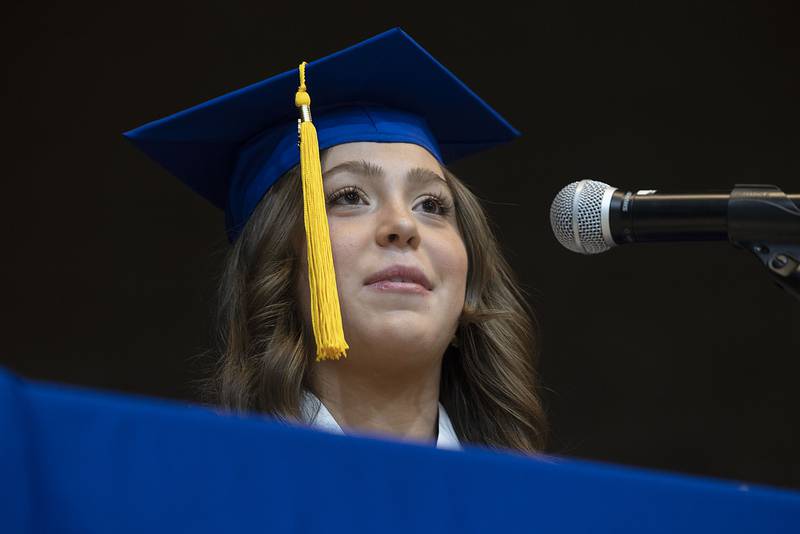 Valedictorian Ainsley Reed delivers her speech Wednesday, May 17, 2023 during Newman High School’s commencement.