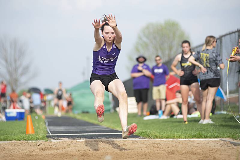 Dixon''s Shea Lehey lands her long jump at the 2A track sectionals in Geneseo on Wednesday, May 11, 2022.