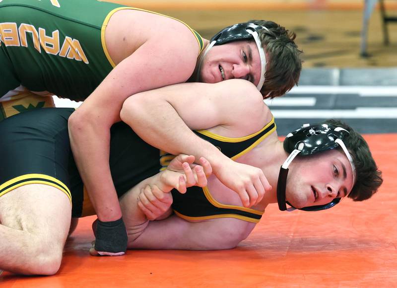 Waubonsie Valley’s Luke Bebar and Metea Valley’s Connor Norton match up at 160 pounds Friday, Jan. 20, 2023, during the DuPage Valley Conference wrestling tournament at DeKalb High School.