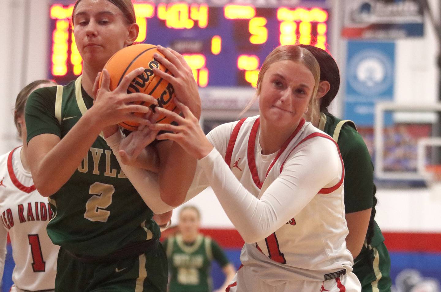 Huntley’s Anna Campanelli, right, tussles with Rockford Boylan’s Carolyn Binzduring varsity girls basketball on Friday, Nov. 22, 2024 at Dundee-Crown High School in Carpentersville.