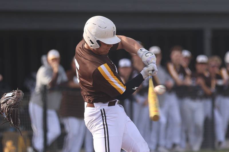 Joliet Catholic’s Derrick Pomatto drives in a run against Lincoln-Way Central on Wednesday, March 25, 2026 in New Lenox.