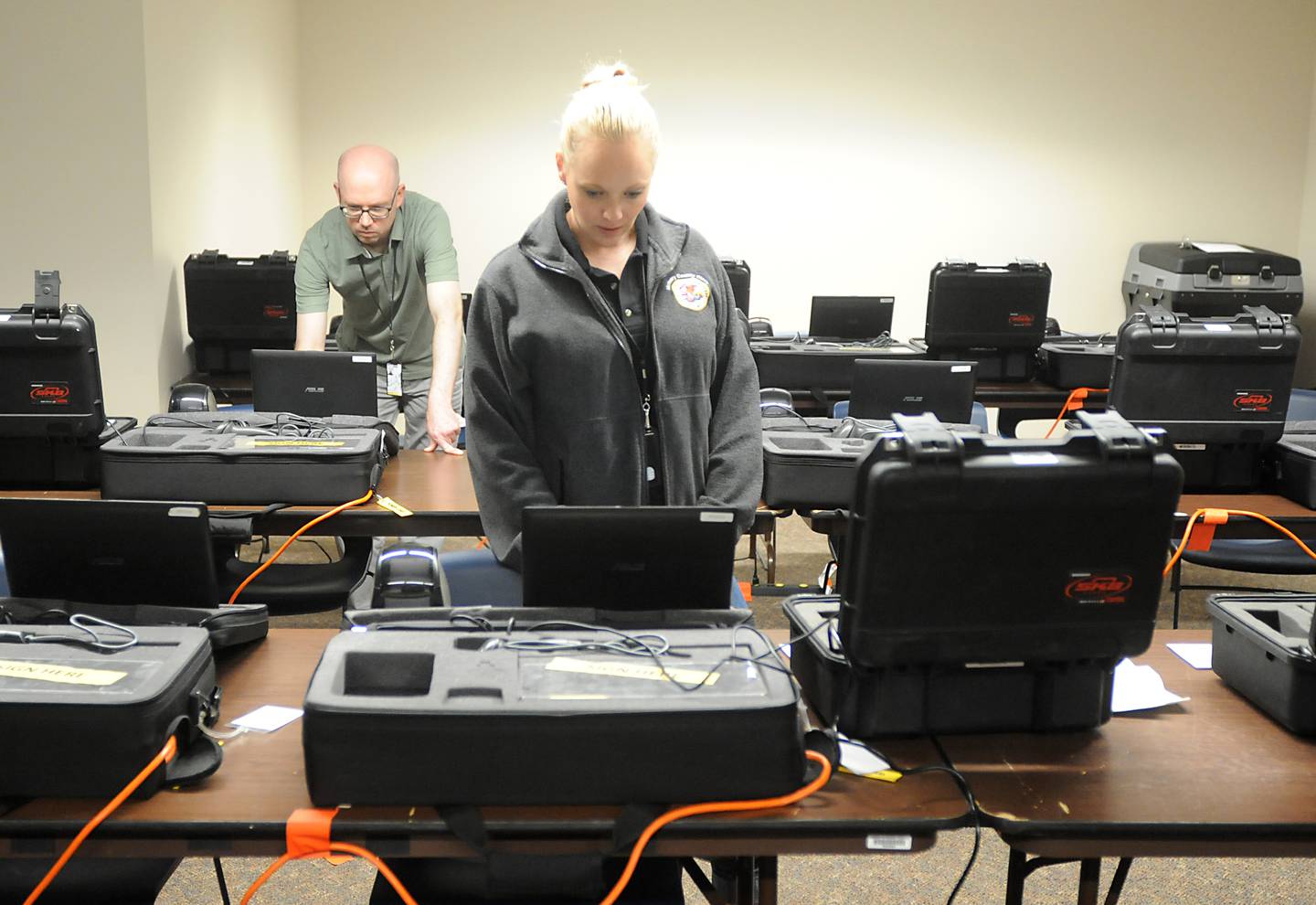 Meghan Honea, an election supervisor with McHenry County, tests and clears history on the voting machines Monday, May 16, 2022, at McHenry County Clerk's Office, 667 Ware Road, in Woodstock, as election judges are trained. Early voting starts for the primary election starts on Thursday, May 19, at the County Clerk's Office.