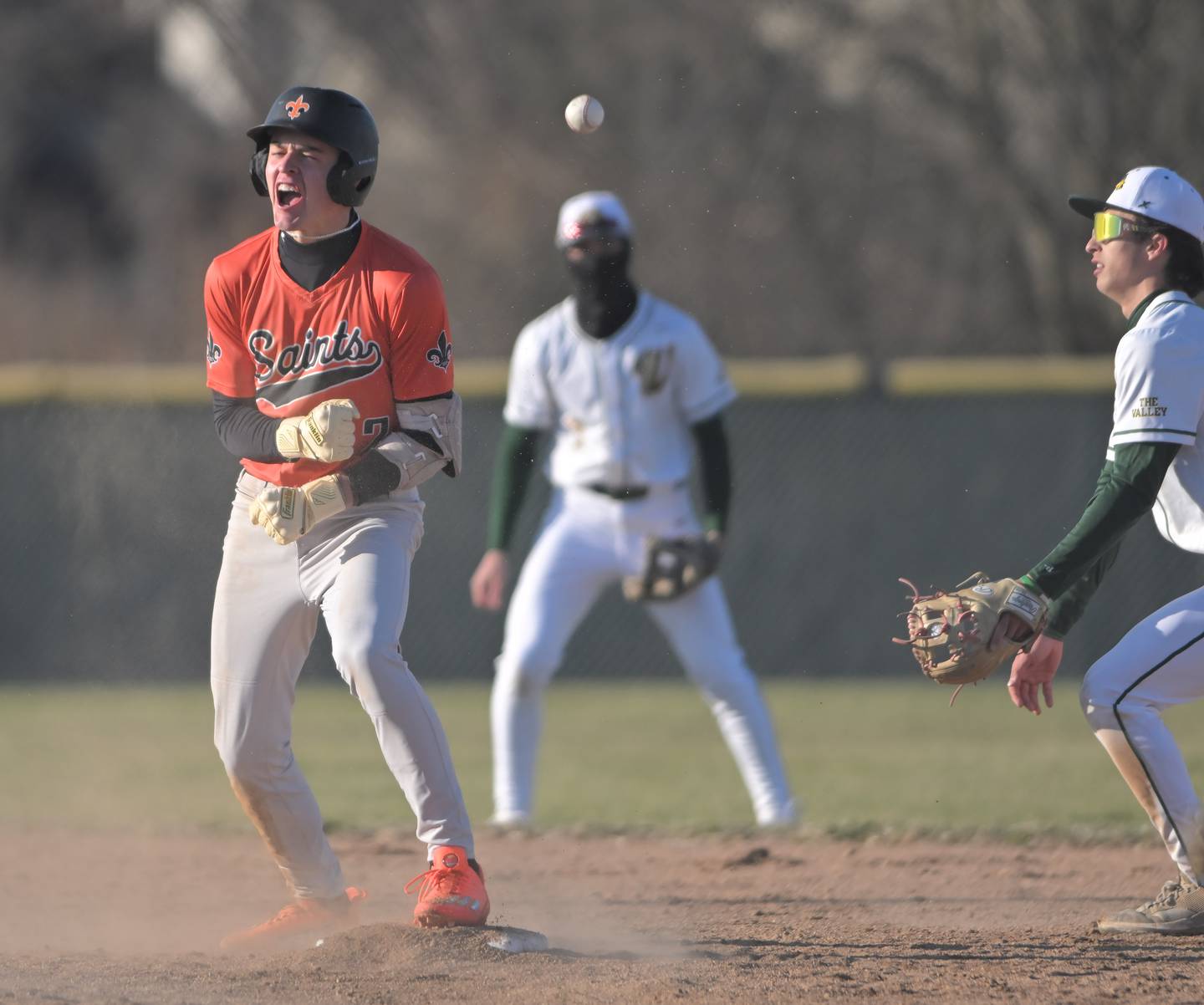 St. Charles East’s James Feigleson reacts after reaching second base safely in a baseball game against Waubonsie Valley in Aurora on Monday, Mar. 23, 2026.