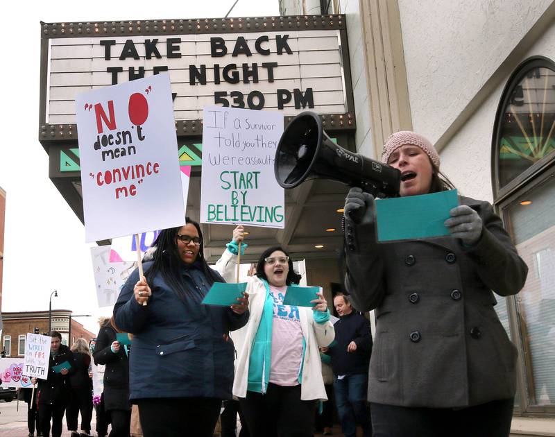Marchers set out on their route Monday, April 7, 2025, during the Safe Passage Take Back the Night and Survivor Speak Out in Dekalb. The event is held in conjunction with Sexual Assault Awareness Month.