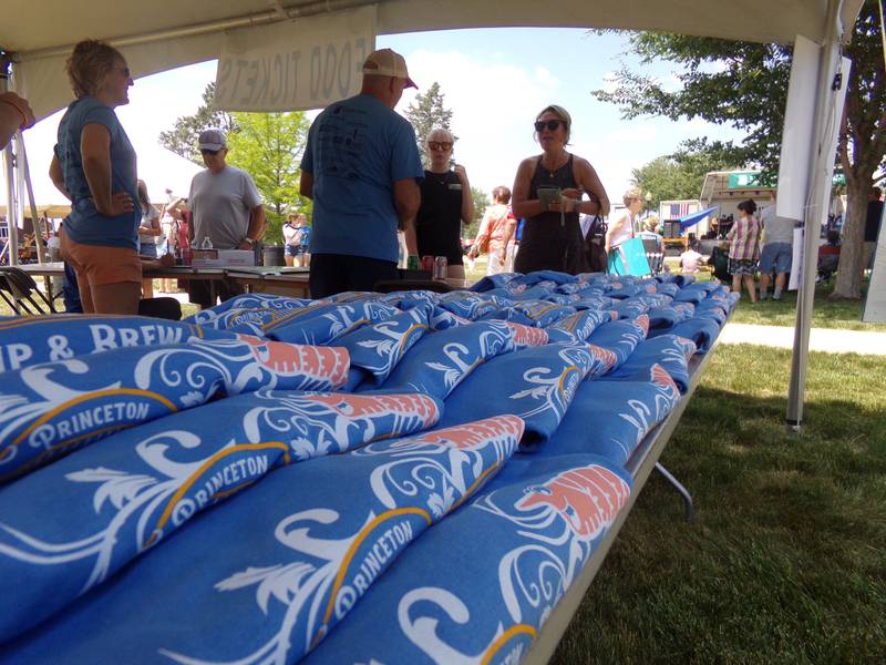 Themed T-shirts were sold Saturday, June 3, 2023, for the Shrimp and Brew Hullabaloo at Rotary Park in Princeton.