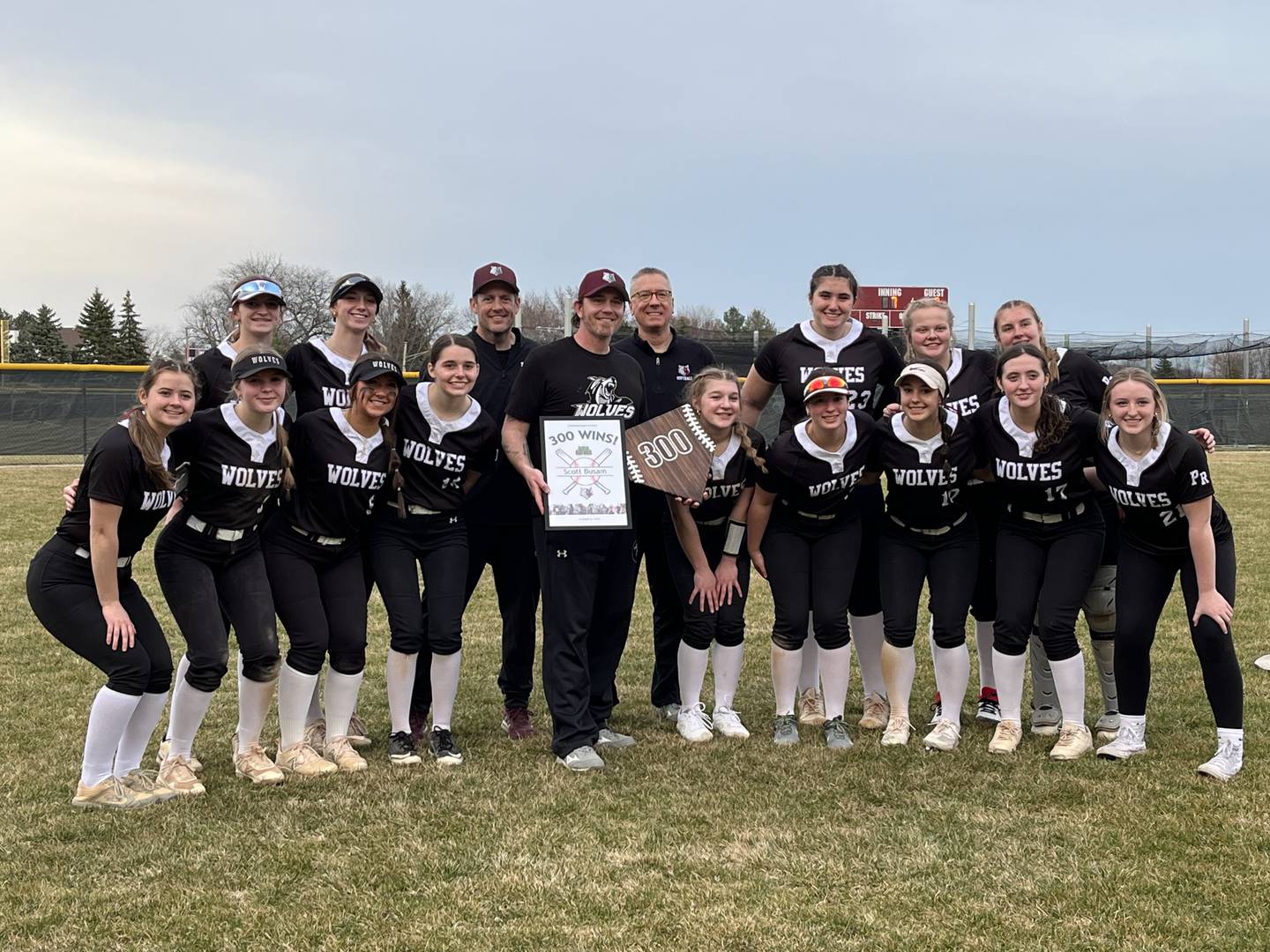 Prairie Ridge coach Scott Busam celebrates his 300th career win after the Wolves beat Larkin 6-3 in their season opener on Tuesday, March 12, 2024 at Prairie Ridge High School in Crystal Lake.