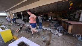 US employers added just 12,000 jobs last month as hurricanes and strikes sharply reduce payrolls