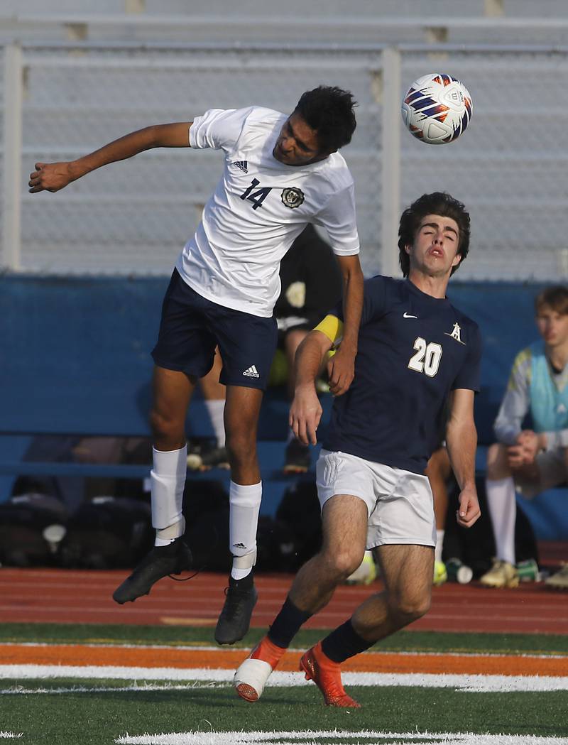 Lemont’s Faraz Ayub heads there ball away from Belleville Althoff Catholic's Bo Gomric during an IHSA Class 3A state semifinal soccer match on Friday, Nov. 8, 2024, at Hoffman Estates High School.