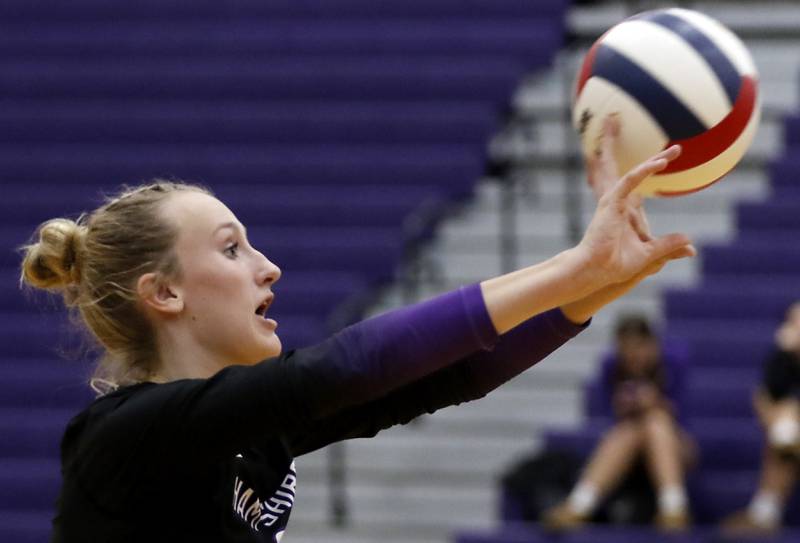 Hampshire's Elizabeth King hits the ball. Over the net during a Fox Valley Conference volleyball match against Crystal Lake Central on Tuesday, Sept. 24, 2024, at Hampshire High School.